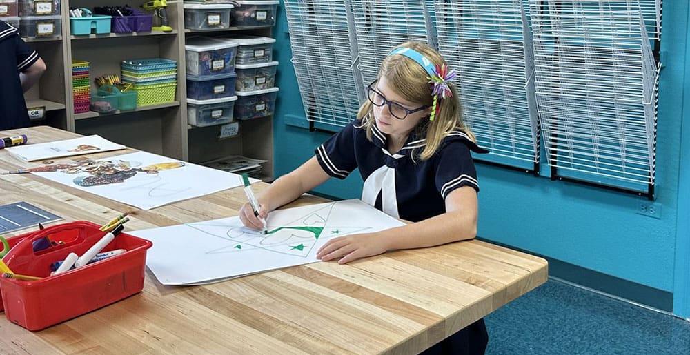 student in St. Luke's school art room