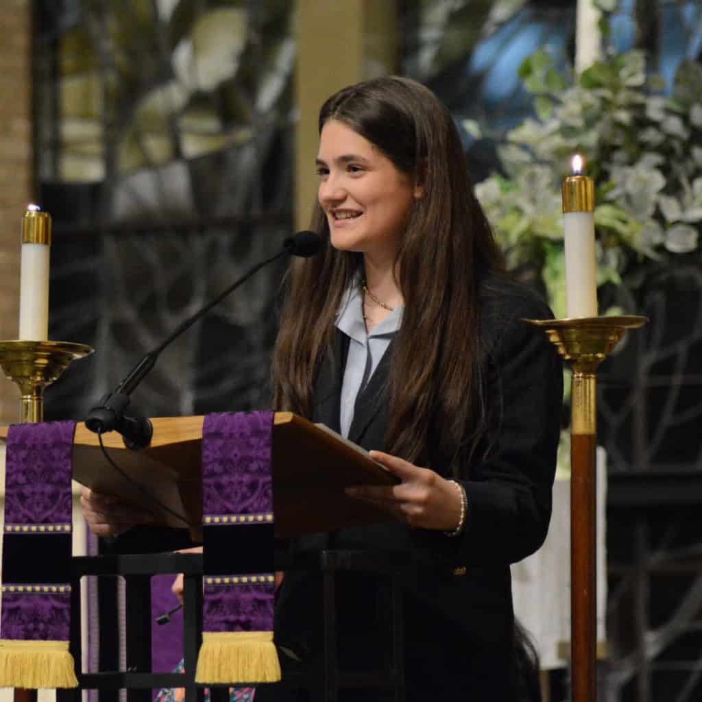 St. Luke's Episcopal School student speaking at podium