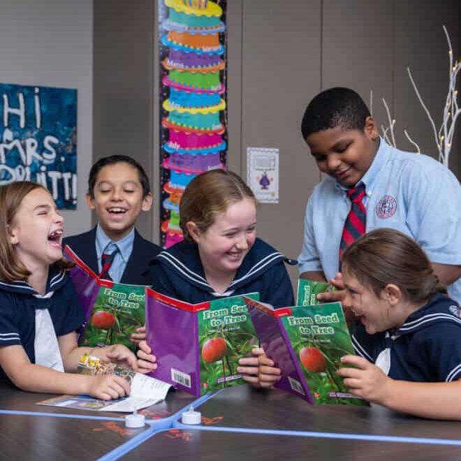 students reading books in class